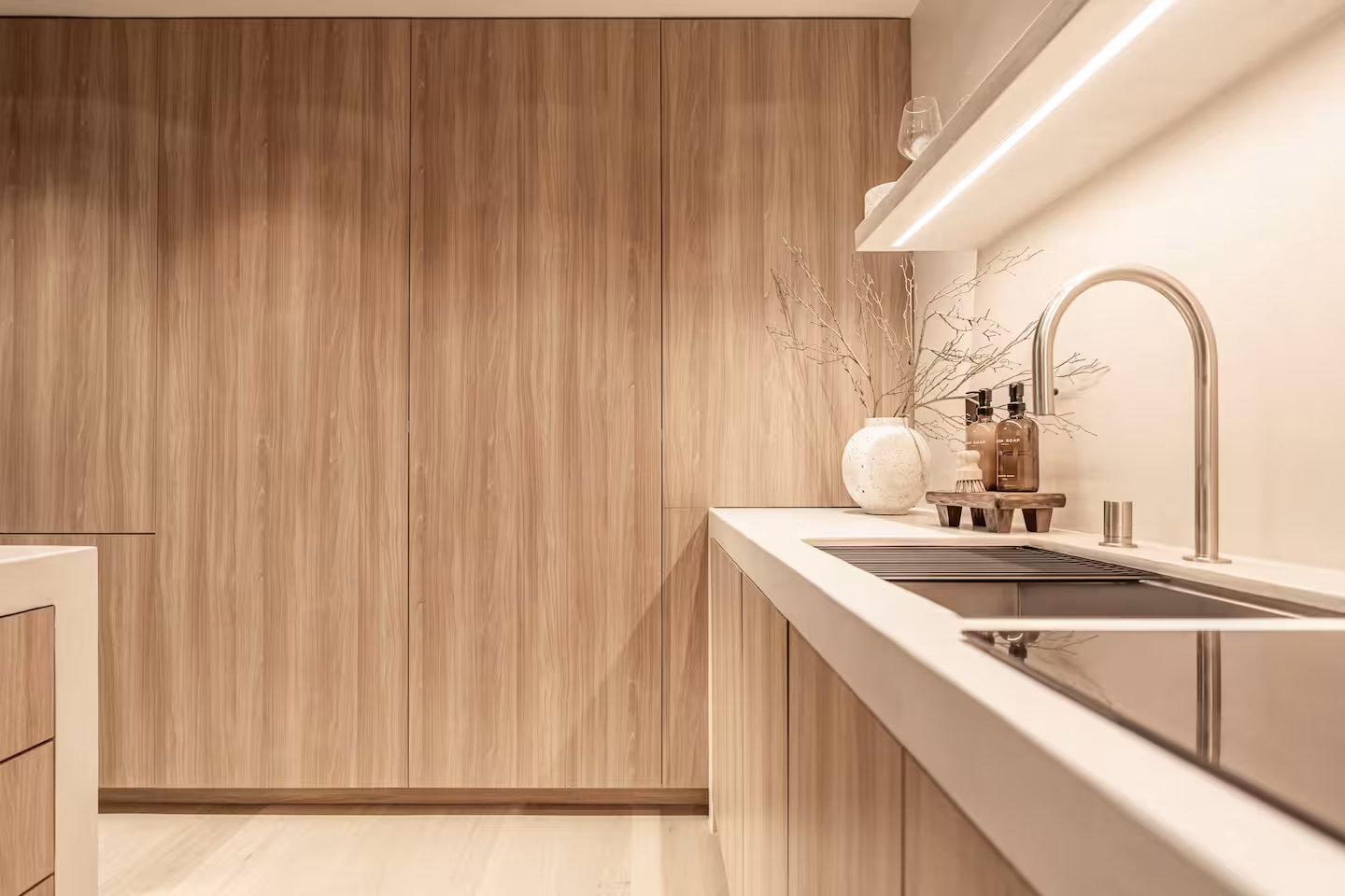 Close view of the wood cabinetry and sink in the Silver Lake kitchen